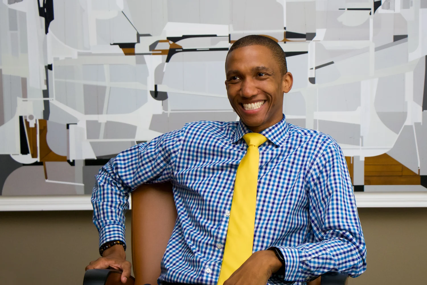 McKinley Malbrough III, founder of Urban Human Resources, at the conference table